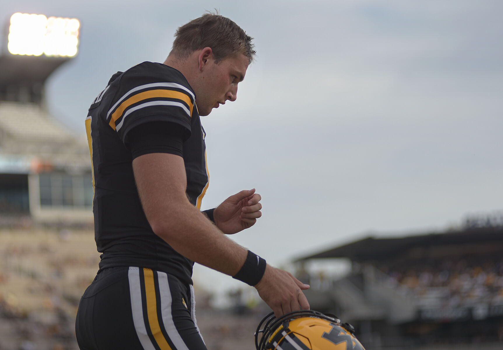 Connor Bazelak walks to the sideline